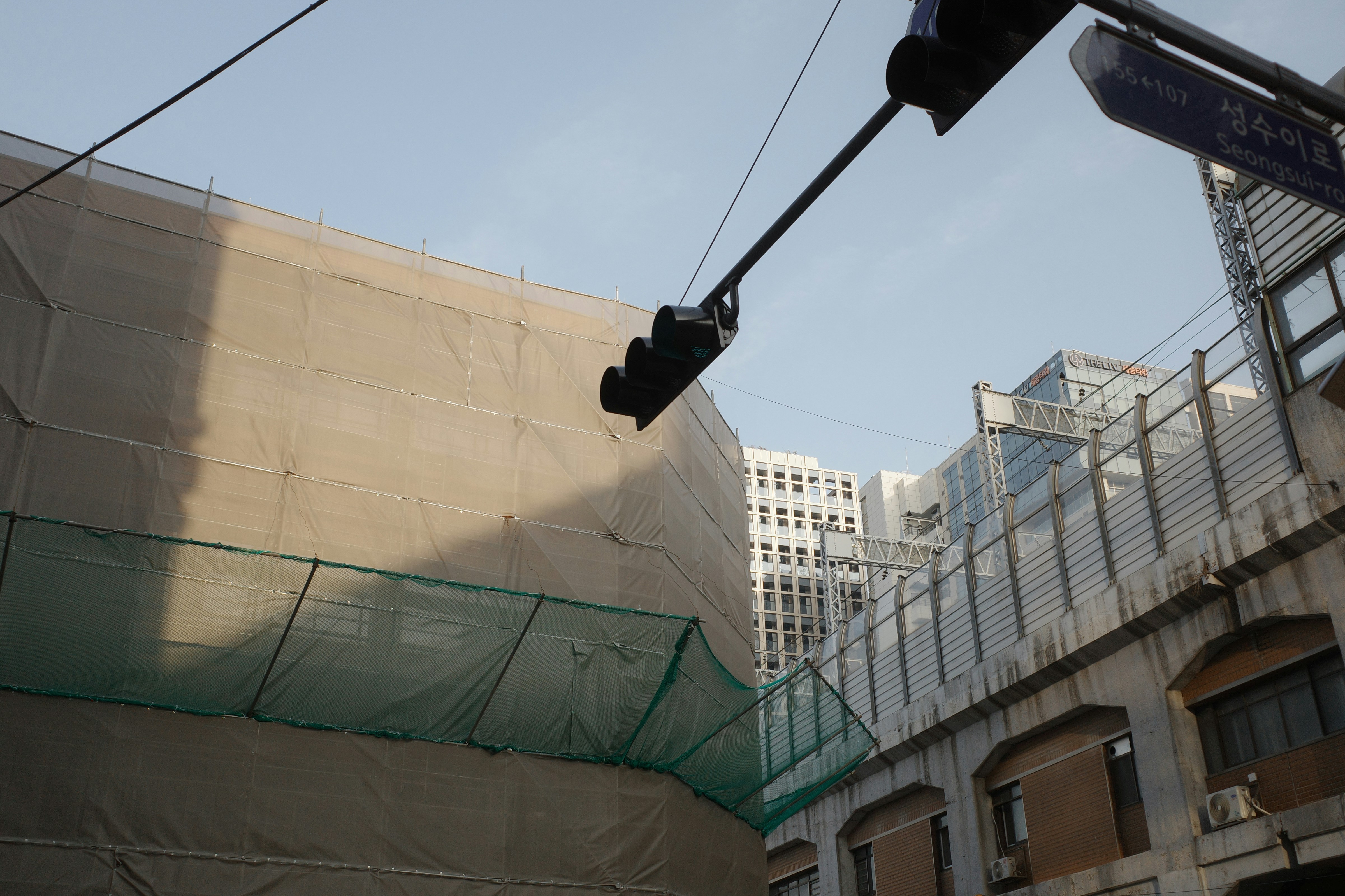 Construction site with fencing and lighting
