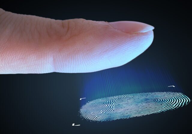 Scanning fingerprint from finger. Biometric and security concept.